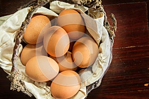 Still life eggs in old basket
