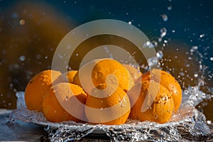 Still life eight oranges with water drops on white plate with water spray