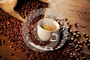 Espresso cup with jute bag and coffee beans