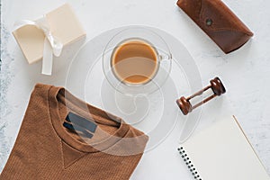 Still life, fashion, business, father`s day concept. T-Shirt and frame for father day`s greeting on white background. Selective