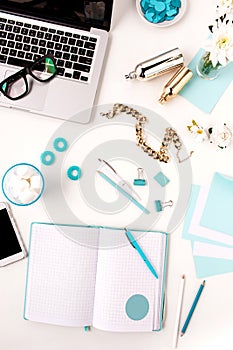 Still life of fashion woman, blue objects on white