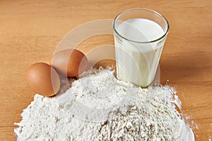 Still life of flour, milk and eggs