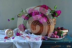 still life with flowers in a basket