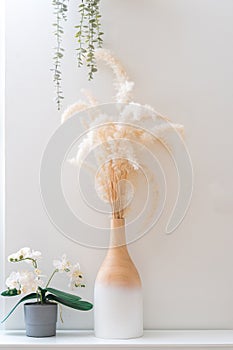 Still life of flowers in a glass on table