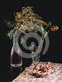 Still life with flowers in vases and dryings. Still Life in a Low Key