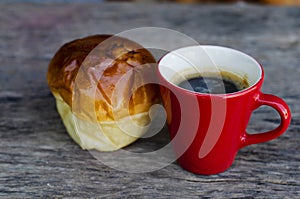 Still life food and drink with hot coffee and bun bread