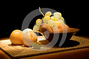 Still-life with fruit in a vase