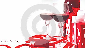Still life with a gift box, red satin ribbon and two glasses of wine on a white background. Valentine`s Day card with copy space.