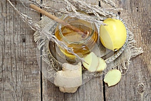 Still life with ginger,lemon,honey and herbs de Provence