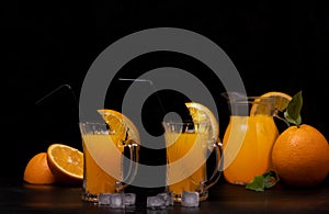 Still life of a glass of fresh orange juice on a vintage wooden table with copy space background