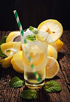 Still Life Glass of Lemonade Soft Drink Lemon Juice on Wooden Table R
