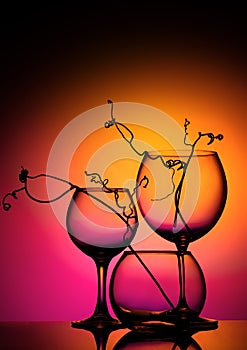 Still life with glass objects on a multicolored background