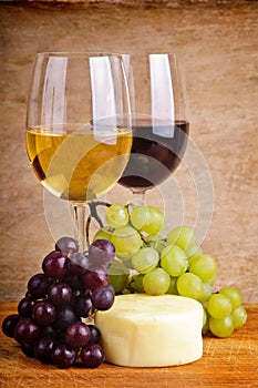 Still life with grapes, cheese and wine