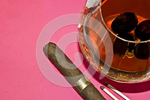 Still Life - grapes in a glass of cognac, cigars a
