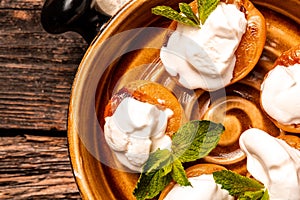 Still life with grilled peaches, apricots, nectarines and ice cream on a wooden background. banner, catering menu recipe place for