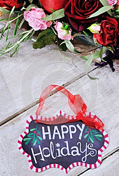 Still life with Happy Holidays sign