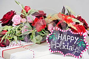 Still life with Happy Holidays sign