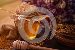 Still life with honey, honeycomb, pollen and propolis