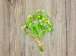 Still life with linden flower bouquet. Flat lay, top view