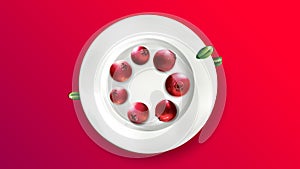 Still life of lingonberries arranged in a circle on a white plate.