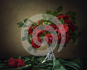 Still life with luxurious red garden roses