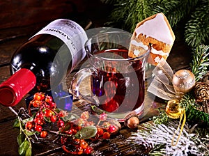 Still life of lying on table wine bottle and mug .