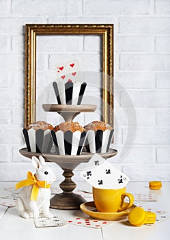 Still life Mad tea party with muffins