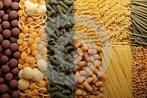 Still life with many different types of pasta. Pasta made from durum wheat of different colors and sizes. Large selection of pasta