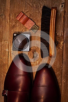 Still life with men`s leather shoes and accessories for shoes ca