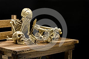 Still life of model skeleton in Halloween concept