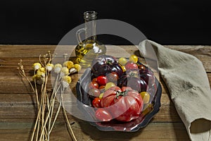 Still life with nectarines, paraguayas and ripe plums