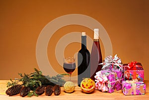 Still life with New Year\'s decorations and packages on a wooden table