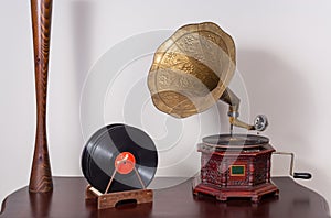 Still life of a nineteenth century phonograph and vinyl records