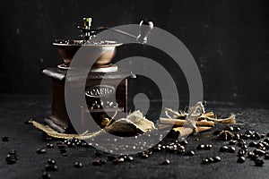 Still life old Coffee Grinders on background black. - Image