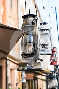 Still life of old hurricane lamp. Vintage lamp. Kerosene lamp. Old-fashioned equipment. Ancient decor. Retro gas lamp.