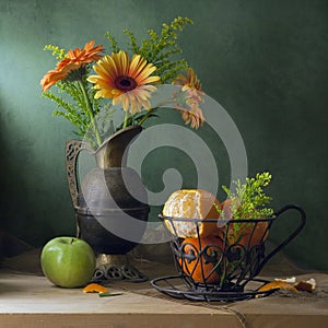 Still life with orange gerbera daisy flowers