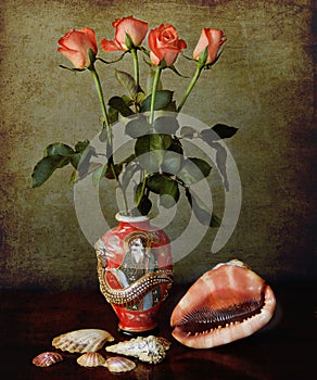 Still life: oriental vase with orange roses and shells on a grunge background
