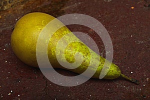 Still life pear- rusty metal background