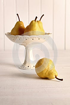 Still life of pears in fruit bowl