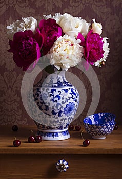 Still life with peonies in a vase