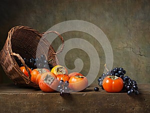 Still life with persimmons and grapes