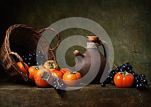 Still life with persimmons on the table