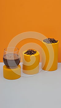 still life photography a cup of coffe and many coffe beans