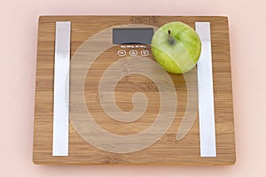 Still Life photography with a green apple and a scale photo