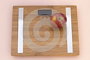 Still Life photography with a red apple and a scale photo