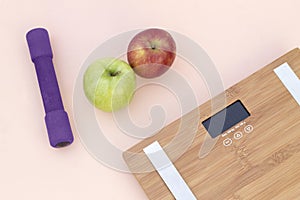 Still Life photography with apples, weight and a scale photo