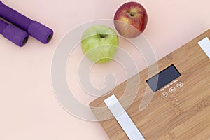 Still Life photography with aapple, weight a scale photo