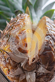 Still life of pineapple whole on wooden