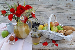 Still life with poppies and apples photo