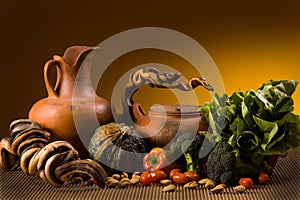 Still life with pottery and vegetables photo